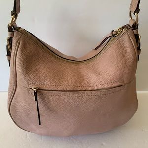 Kate Spade leather  shoulder bag preowned rose quartz color  in good condition .